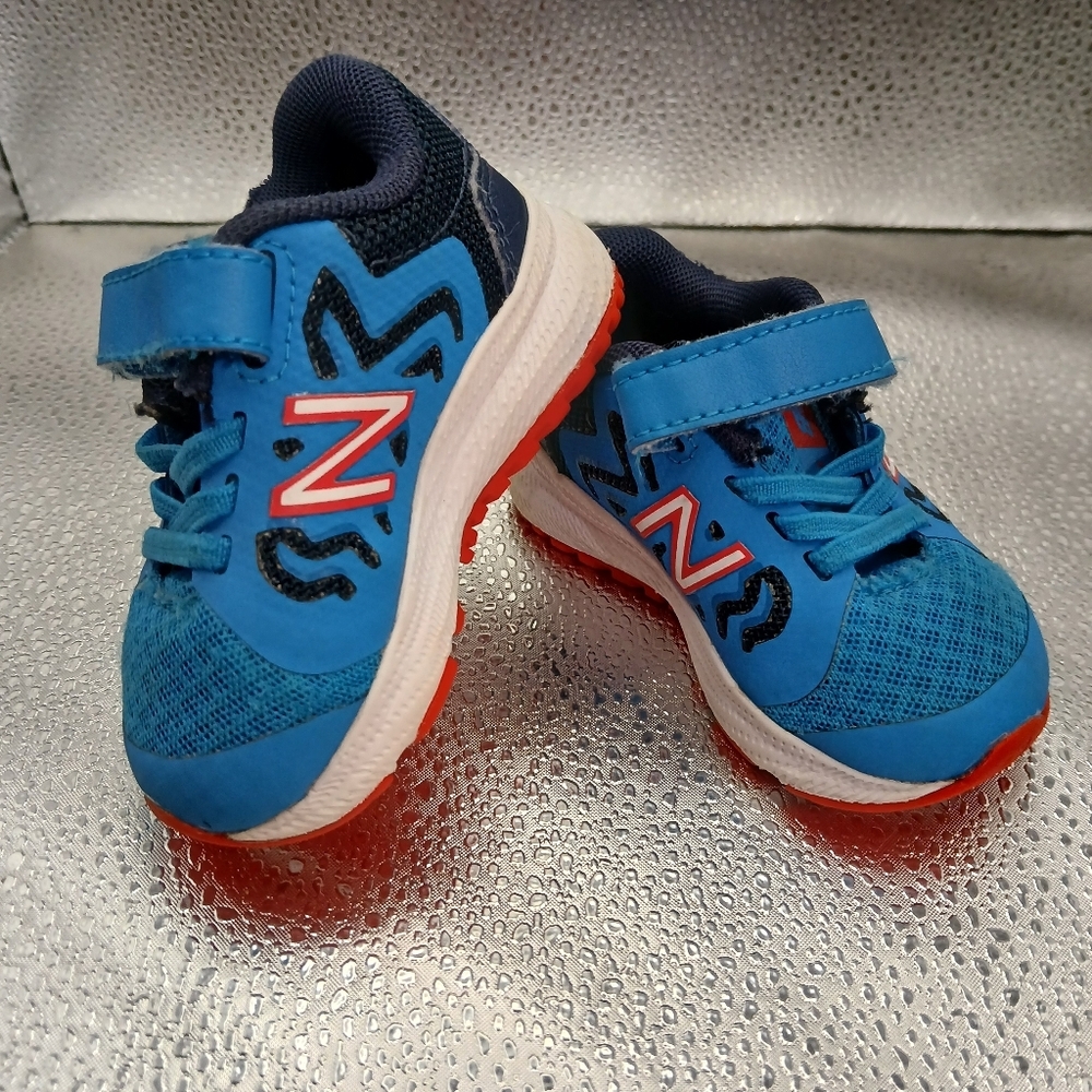 New Balance Kids Blue and Red Shoes